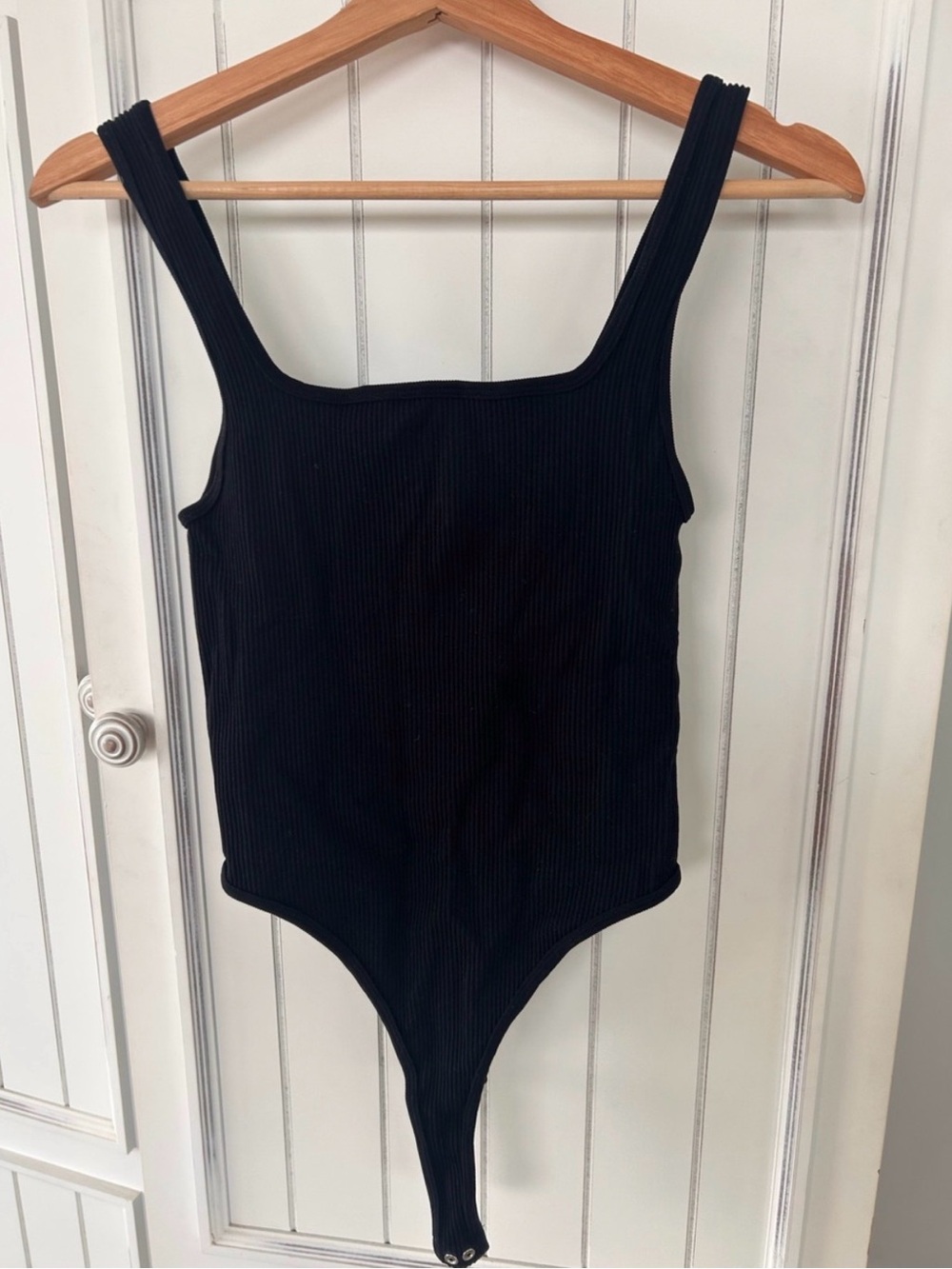 Black Ribbed One-Piece Bodysuit